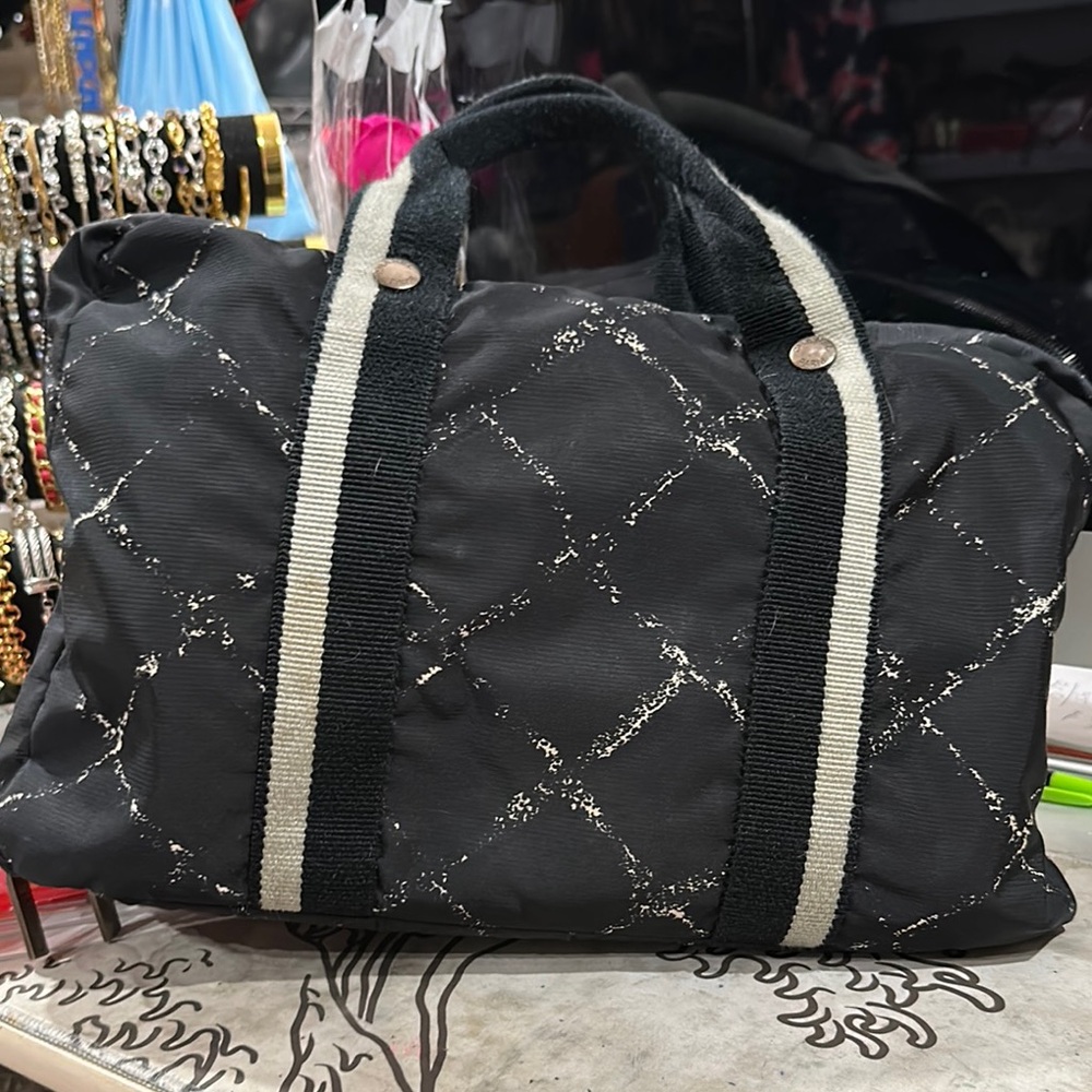 CHANEL Black Quilted Travel Bag